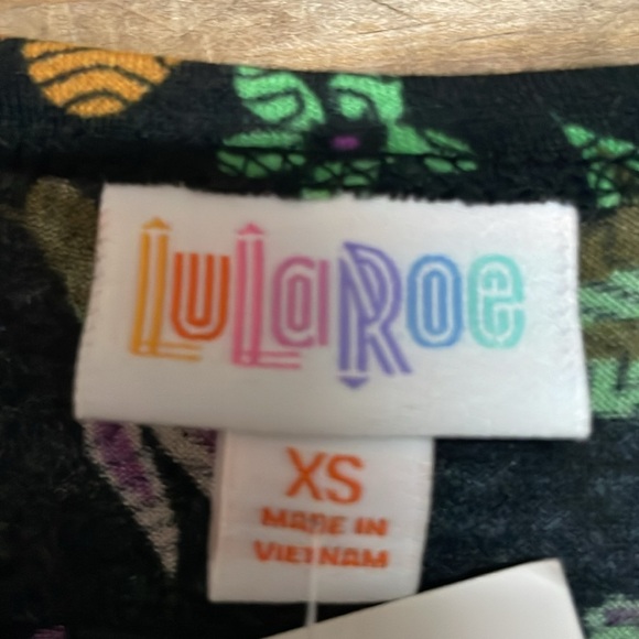 LulaRoe size XS Color Floral Black Carly High-low Short Sleeve Dress with pocket - Picture 2 of 7